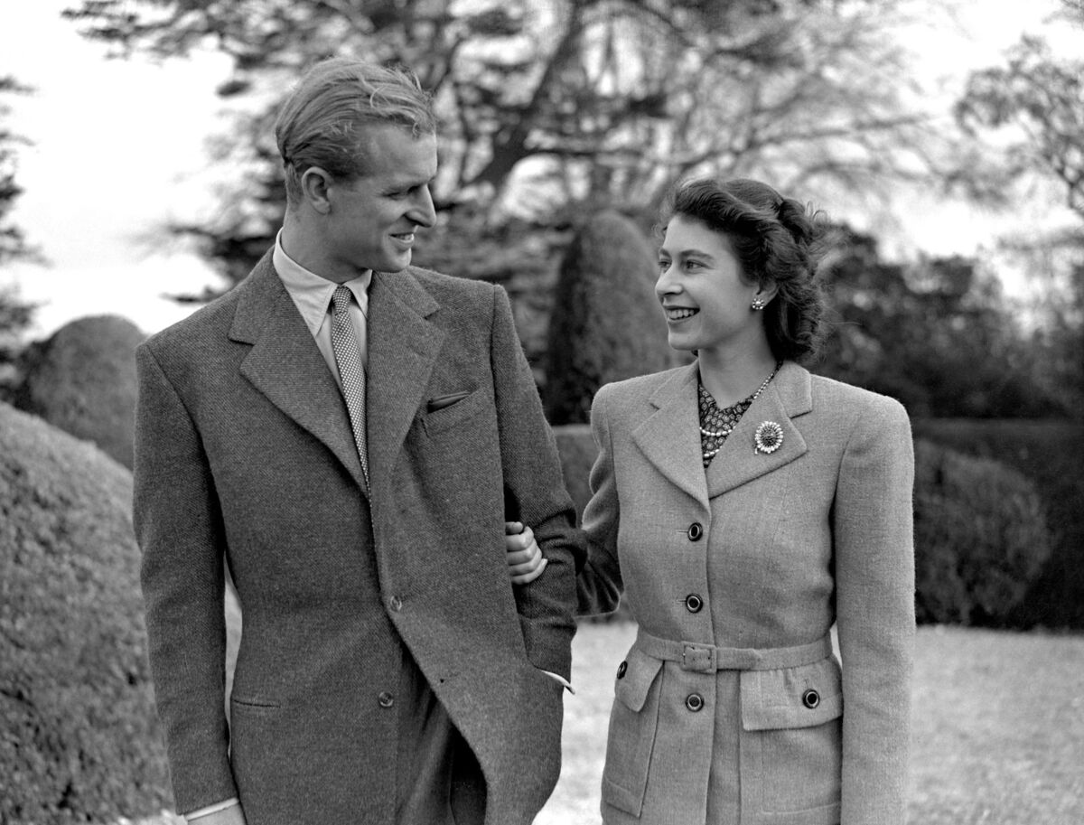 Elizabeth enjoying a stroll with her husband, Philip. This was their first public appearance since their wedding.