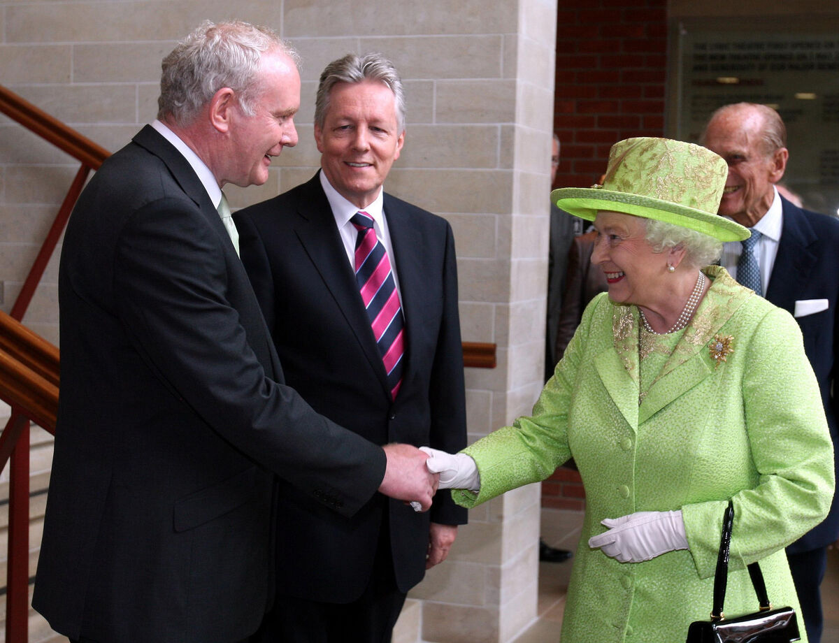 Queen Elizabeth II shakes hands with Northern Ireland deputy first minister Martin McGuinness, watched by first minister Peter Robinson, during a trip to the North in June 2012 that would have been unthinkable even 10 years earlier. Queen Elizabeth II shakes hands with Northern Ireland deputy first minister Martin McGuinness, watched by first minister Peter Robinson, during a trip to the North in June 2012 that would have been unthinkable even 10 years earlier.