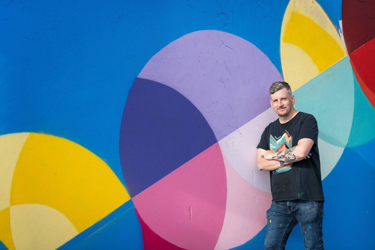 Pictured: Artist Shane O'Malley at his mural on the Lower Glanmire Rd, Cork, for Ardú 2021. Picture: John Beasley Pictured: Artist Shane O'Malley at his mural on the Lower Glanmire Rd, Cork, for Ardú 2021. Picture: John Beasley