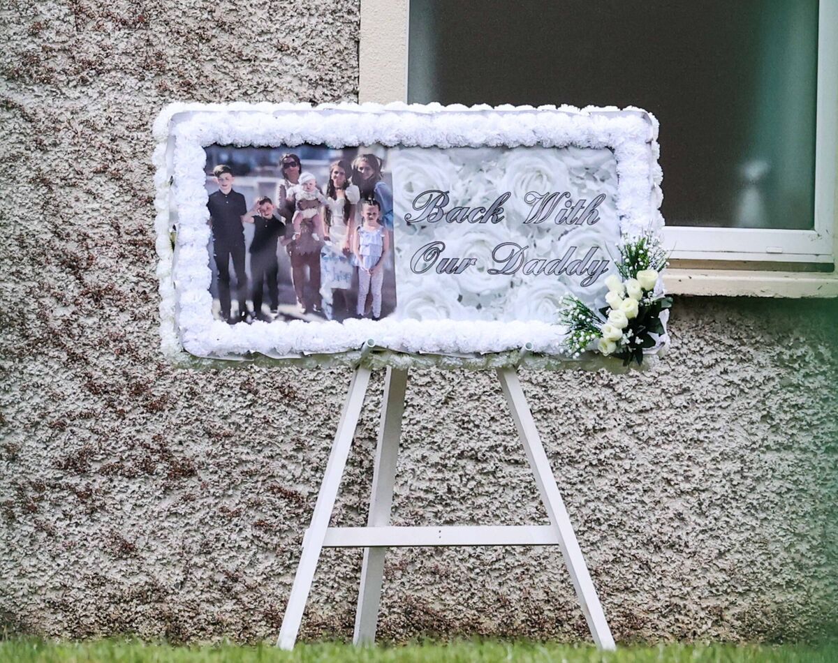  A funeral sign with the words "Back With Our Daddy" outside St Aidan’s Church, Brookfield, Dublin, where the funeral of Lisa Cash, Chelsea and Christy Cawley takes place today. Photo: Sam Boal / RollingNews.ie