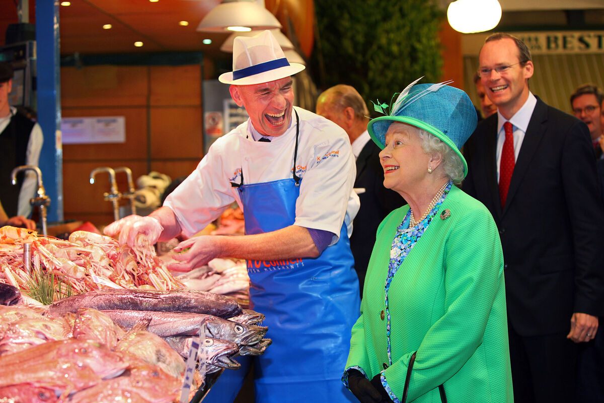 Queen Elizabeth II meeting Fish Monger Pat O'Connell at The English Market. Picture: Maxwells