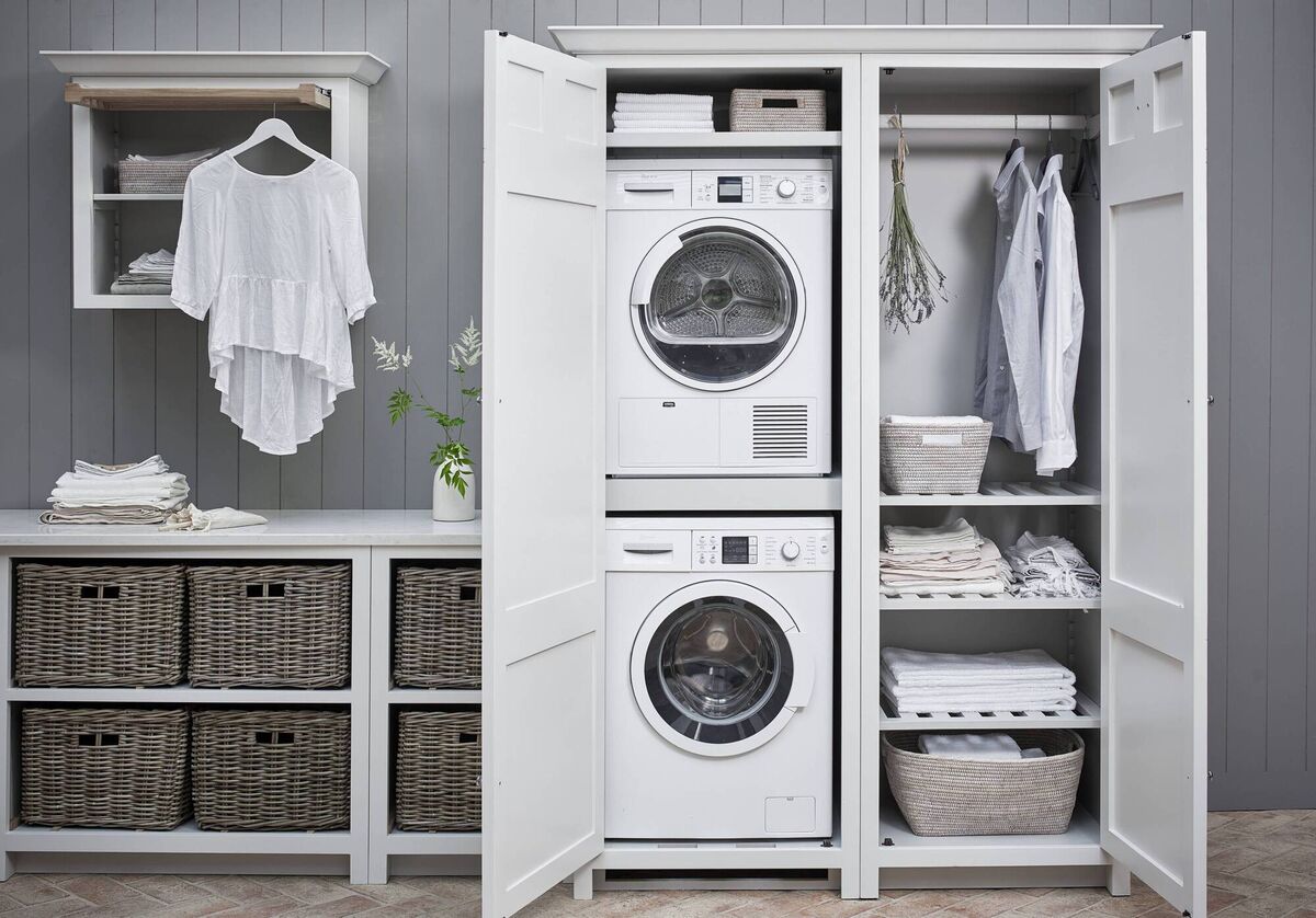 Washing machine below and tumble dryer above; cabinet from Neptune's Chichester.
