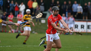 <p>Charleville's Darragh Fitzgibbon shoots despite the outstretched arm of Na Piarsaigh's Anthony Dennehy during the Co-Op Superstores Cork premier SHC relegation/playoff at Mourneabbey Picture; Eddie O'Hare</p>
