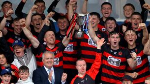 <p>NINE-IN-A-ROW: Ballygunner’s joint captains Ian Kenny and Dessie Hutchinson lift the cup. Pic: INPHO/James Crombie</p>