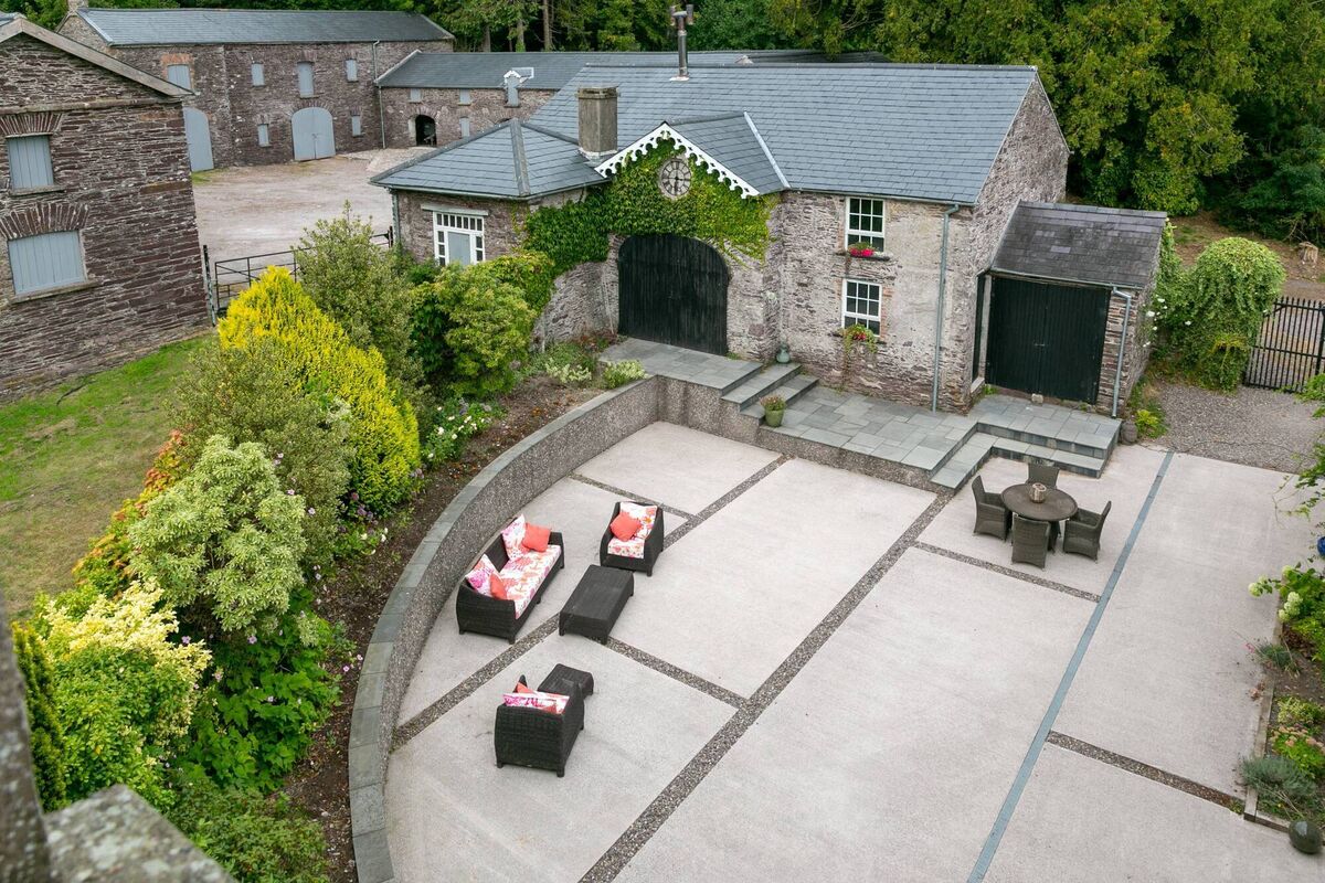 Patio links to courtyard and 1.5 acre walled garden