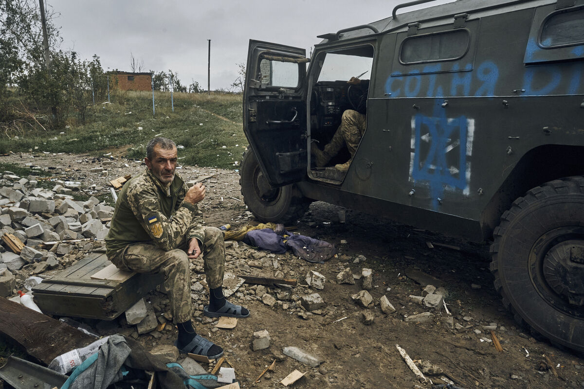 A Ukrainian soldier takes a break in the freed territory in the Kharkiv region. Picture: AP /Kostiantyn Liberov