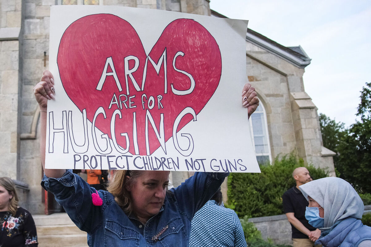 A vigil last May against gun violence, but now the spiralling cost of living is most Americans' greatest fear. Picture: AP Photo/Eduardo Munoz Alvarez