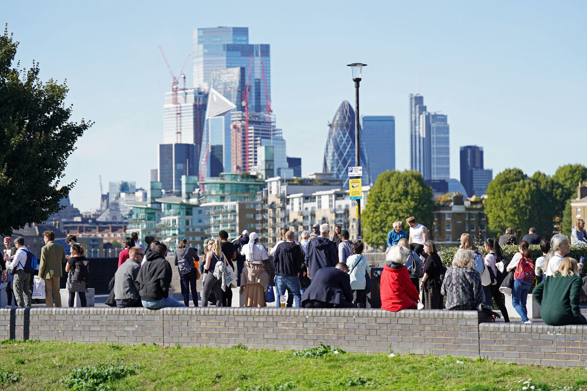 Just over halfway through the queue, near the Blackfriars Bridge, it’s deeply surreal to hear '70s and '80s pop songs play out over a speaker as people file slowly but steadily by the southern bank of the Thames. Picture: James Manning/PA Wire