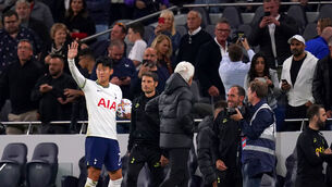 <p>KEEPSAKE: Tottenham Hotspur's Son Heung-min waves to the fans as he leaves the pitch with the match ball at the end of the game. </p>