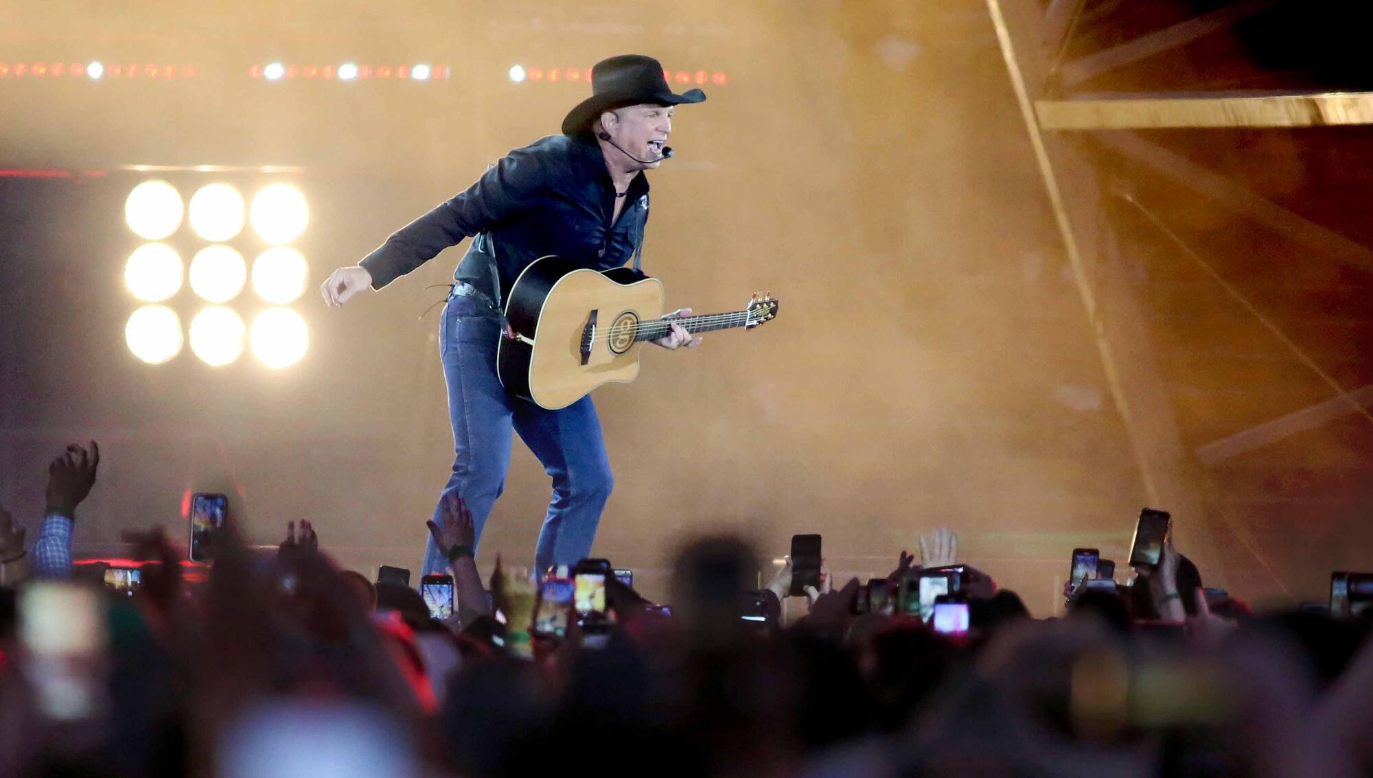 Garth Brooks review: Fifth night delights fans as star hints at return visit