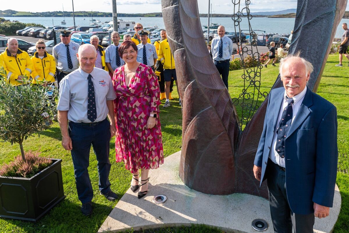 Retired lifeboat coxwain Kieran Cotter cut the ribbon. He is pictured with Colin Whooley and Tara Cotter with the Baltimore lifeboat crew.