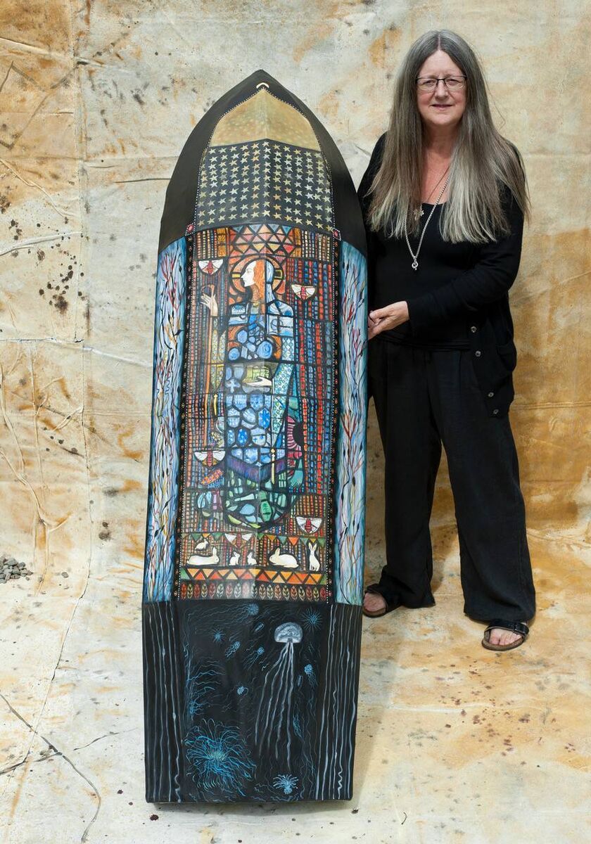 Kathleen Furey and her currach piece inspired by Harry Clarke. Picture: Rynes Walker