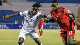 <p>BAN: Honduras' Wisdom Quaye, left, and Canada's Cyle Larin fight for the ball during a qualifying soccer match for the FIFA World Cup Qatar 2022 in San Pedro Sula, Honduras. (AP Photo/Delmer Martinez, file) </p>