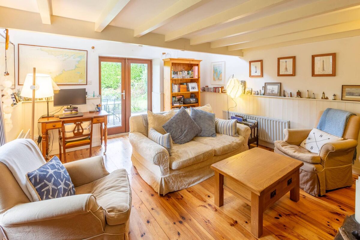 Living room with double doors to patio Living room with double doors to patio