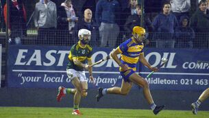 <p> BALANCE: Cloughduv's William Ahern tackling John Cronin of Lisgould. Pic: Denis Boyle</p>