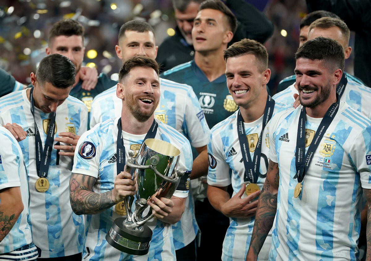 Argentina's Lionel Messi celebrates with the Finalissima 2022 trophy.