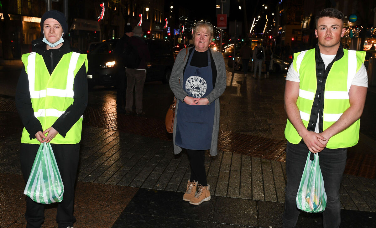 Caitriona Twomey of Cork Penny Dinners with knight riders Ryan McEvoy, College Road. and Keith McInerney, Hanover Street, on their way to give out food parcels to people on the streets in Cork city. Picture: David Keane Caitriona Twomey of Cork Penny Dinners with knight riders Ryan McEvoy, College Road. and Keith McInerney, Hanover Street, on their way to give out food parcels to people on the streets in Cork city. Picture: David Keane