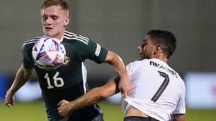 <p>Northern Ireland's Alistair McCann, left, fights for the ball against Greece's Giorgos Masouras. </p>