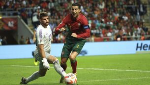 <p>THWARTED: Spain's goalkeeper Unai Simonsaves on an attempt to score by Portugal's Cristiano Ronaldo during the UEFA Nations League soccer match between Portugal and Spain at the Municipal Stadium in Braga. Pic: AP Photo/Luis Vieira</p>
