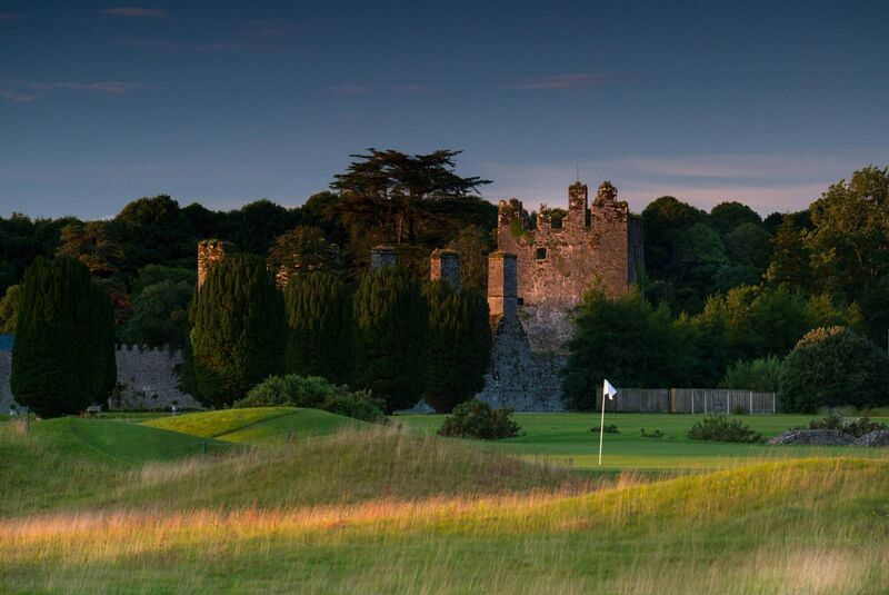Golf course with ruins of Castle in the background Golf course with ruins of Castle in the background