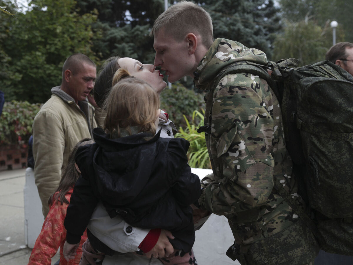A Russian recruit and his wife kiss outside a military recruitment center in Volzhskiy, Volgograd region, Russia, Wednesday, Sept. 28, 2022. Picture: AP Photo