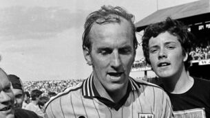 <p>A giant in blue: Brian Mullins of Dublin leaves the pitch after the 1983 Leinster Senior Football Championship quarter-final replay between Meath v Dublin in Croke Park in Dublin. Pic: Ray McManus/Sportsfile.</p>