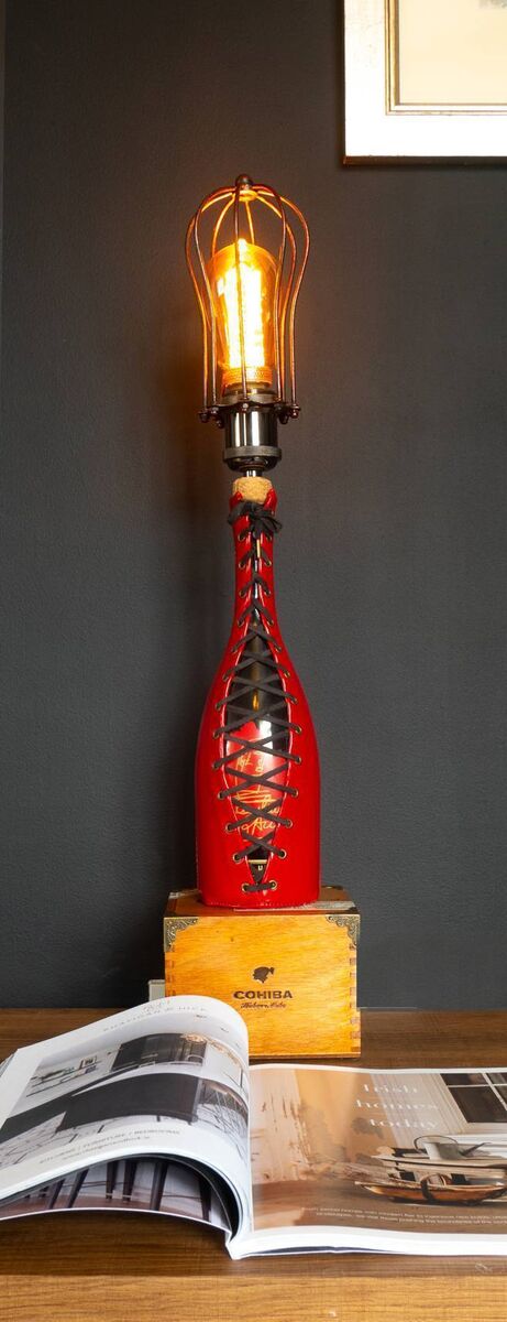 ‘Champagne Life’: Self-designed lamp from the remnants of a family celebration. Jean Paul Gaultier Packaged Piper Heidseick Champagne and Cohiba Cigars. Made by Colum Burke. Instagram: lampdbycolum ‘Champagne Life’: Self-designed lamp from the remnants of a family celebration. Jean Paul Gaultier Packaged Piper Heidseick Champagne and Cohiba Cigars. Made by Colum Burke. Instagram: lampdbycolum