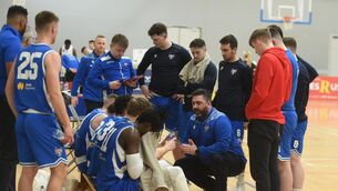 <p>TALKING TACTICS: UCC Demons head coach Daniel O'Mahony talks to his team during a break from play against Abbey Seals Dublin Lions. Pic: Larry Cummins.</p>