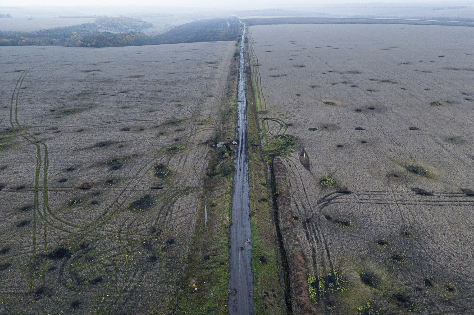 At least 20 killed as Russian forces bomb evacuation convoy in Ukraine