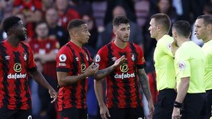 <p>Seeking answers: Bournemouth's Jefferson Lerma (left), Marcus Tavernier (centre) and Marcos Senesi speak to referee Thomas Bramall after the Premier League match at the Vitality Stadium, Bournemouth. Pic: Steven Paston/PA Wire.</p>
