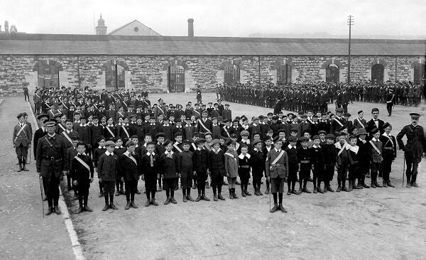Boys Brigade group (with Volunteers in background) parade at Cork’s Cornmarket (near City Hall) in about 1914.
