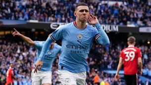 <p>ON FIRE: Phil Foden was one of two Manchester City players to score a hat-trick in the derby. Pic: Martin Rickett/PA</p>
