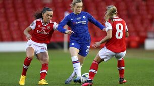 <p>STAR: Erin Cuthbert of Chelsea and Scotland battles Katie McCabe of Arsenal and Ireland. (Photo by Catherine Ivill/Getty Images)</p>
