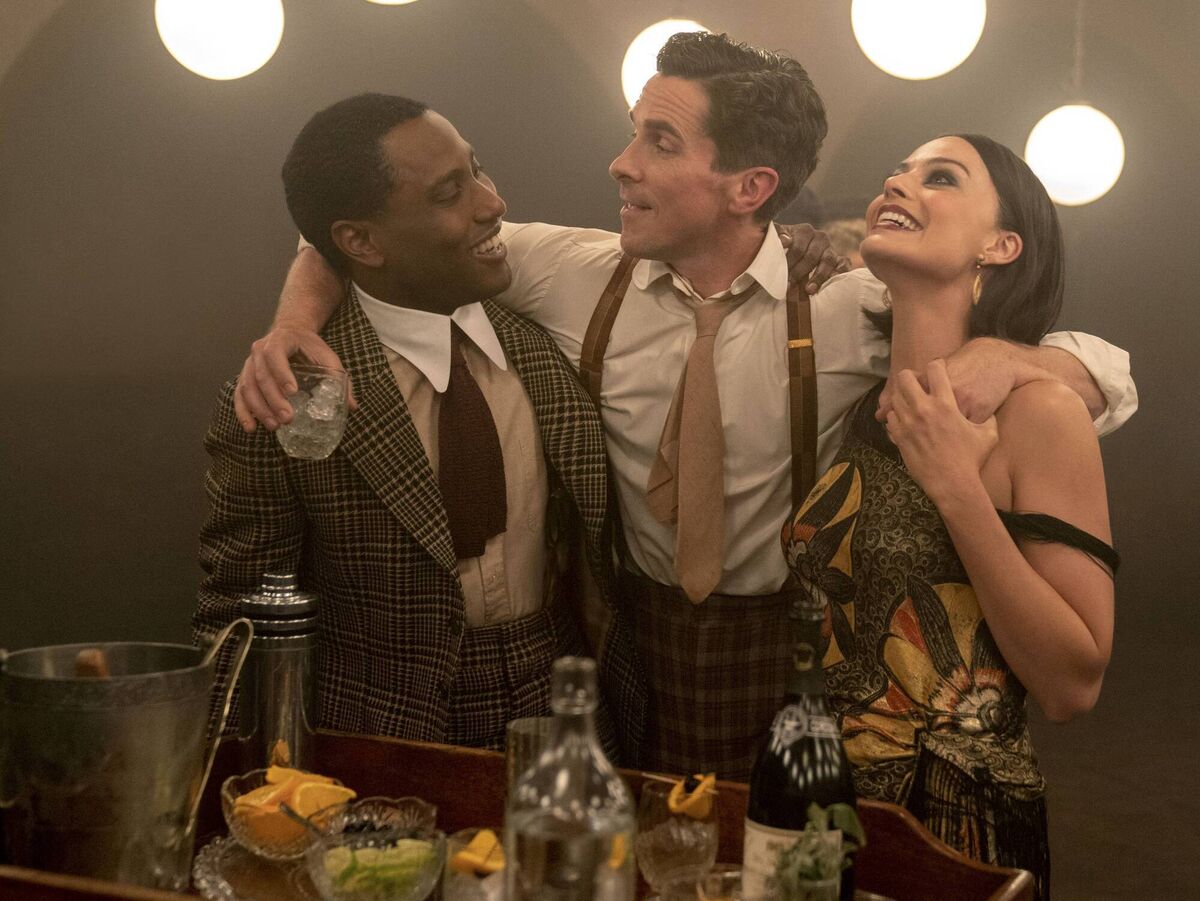 John David Washington as Harold, Christian Bale as Burt, and Margot Robbie as Valerie in 20th Century Studios' Amsterdam. Picture: Merie Weismiller Wallace John David Washington as Harold, Christian Bale as Burt, and Margot Robbie as Valerie in 20th Century Studios' Amsterdam. Picture: Merie Weismiller Wallace