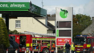 <p>Emergency services at the scene of the explosion. Picture: Brian Lawless/PA Wire</p>