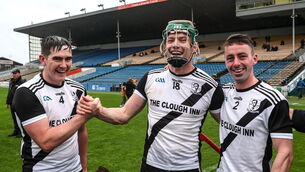 <p>Kilruane MacDonaghs players from left, Kieran Cahill, Thomas Cleary and James Cleary celebrate after their side's victory. </p>