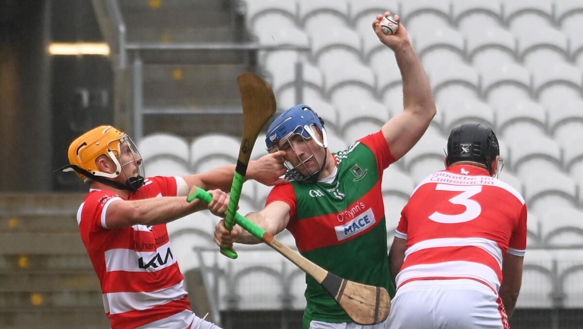 Fr O'Neill's Declan Dalton wins the sliotar from Courcey Rover's Fergus Lordan and Brian Collins during the Co-Op Superstores Cork senior A hurling championship final at Pairc Ui Chaoimh. Picture; Eddie O'Hare