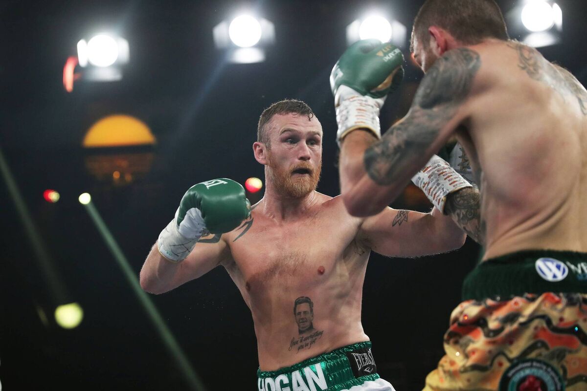 NEWCASTLE, AUSTRALIA - OCTOBER 08: Dennis Hogan (white shorts) competes in his World Title bout against Sam Eggington during the Super Saturday No Limit Boxing event at the Newcastle Entertainment Centre on October 8, 2022 in Newcastle, Australia. (Photo by Peter Lorimer/Getty Images)