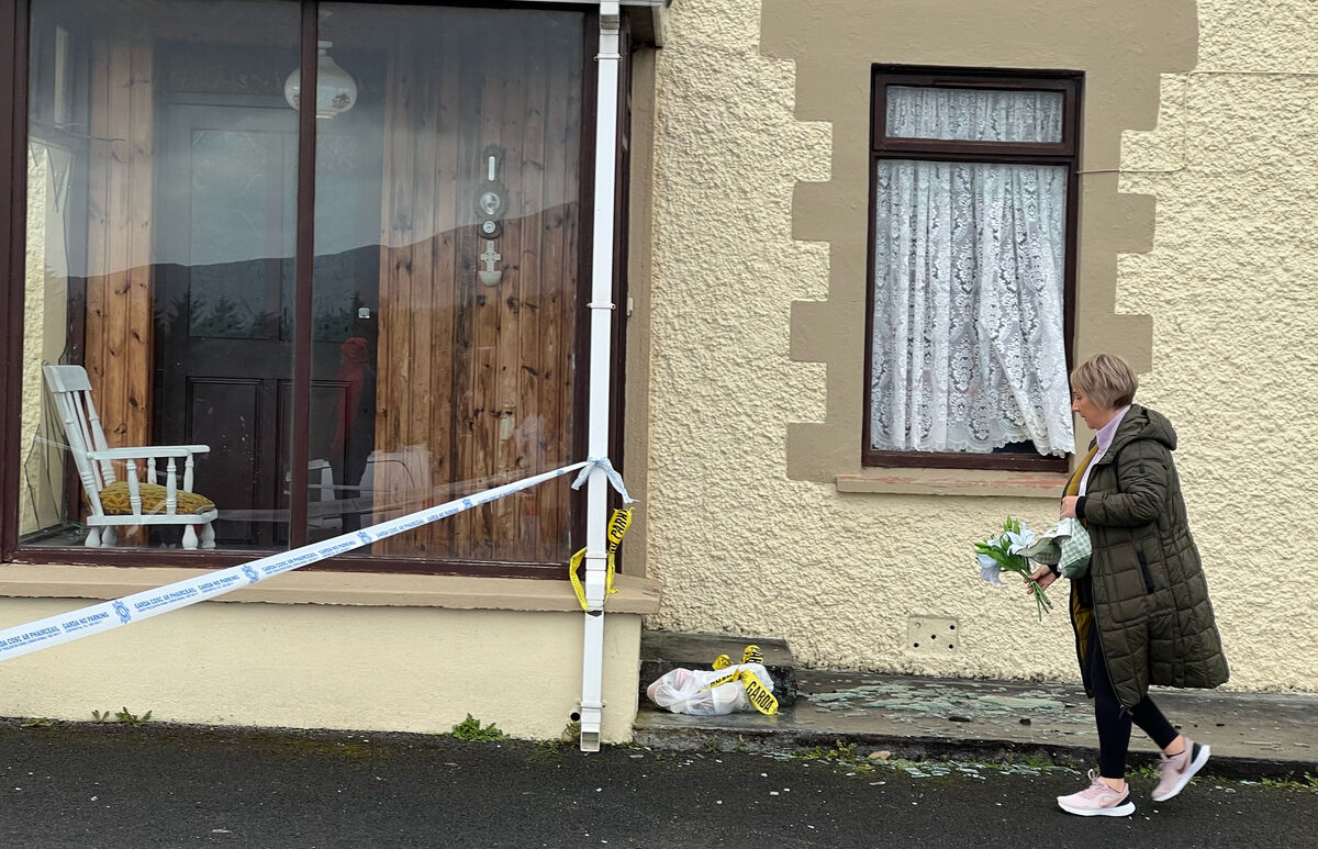 People left flowers and other tributes near the Applegreen filling station where 10 people lost their lives in last Friday's tragedy. Picture: Sasko Lazarov/RollingNews
