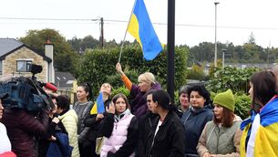 <p>Ukranian supporters wait anxiously prior to the announcement on Wednesday morning they would be allowed stay in Killarney. Picture: Don MacMonagle</p>