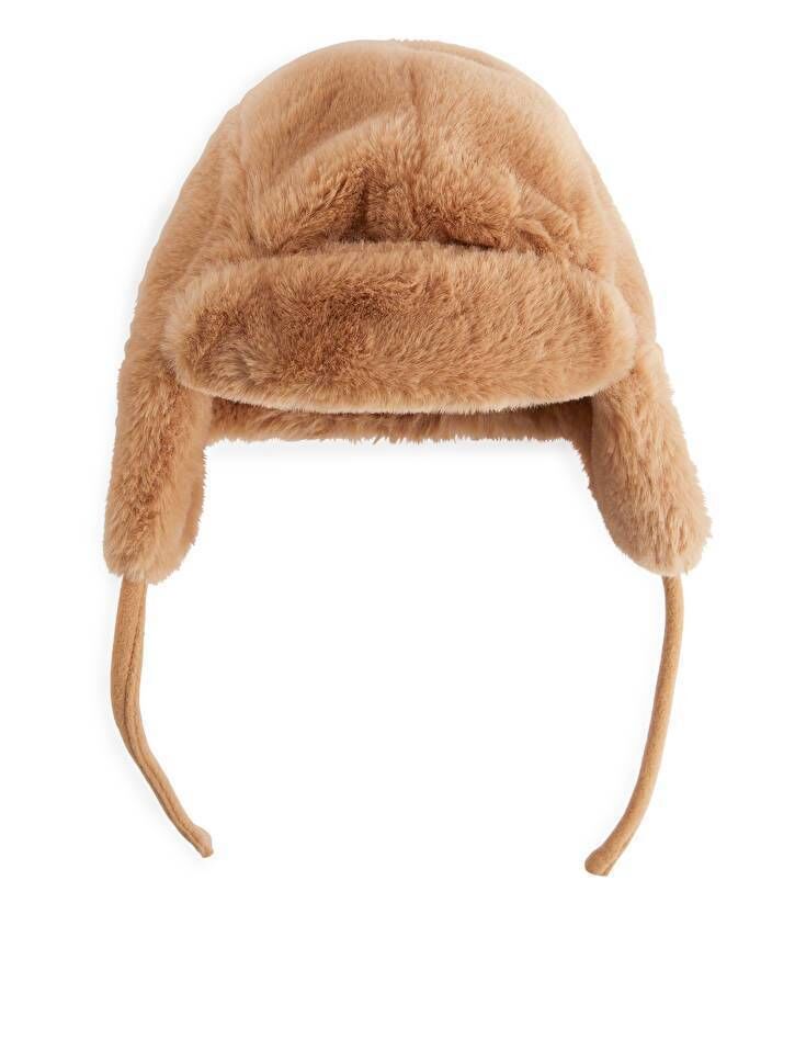 Faux fur recycled polyester hat, Arket, €25 Faux fur recycled polyester hat, Arket, €25