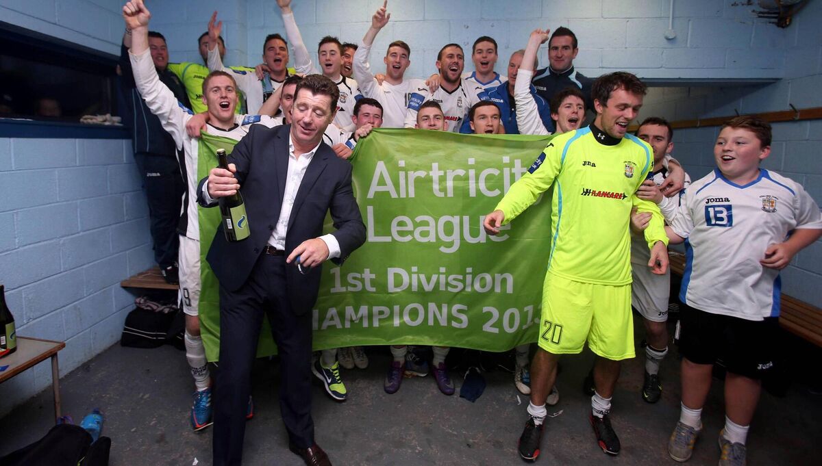 GETTING RESULTS: Roddy Collins and The Athlone team celebrate in the dressing room after winning promotion. Pic: ©INPHO/Donall Farmer