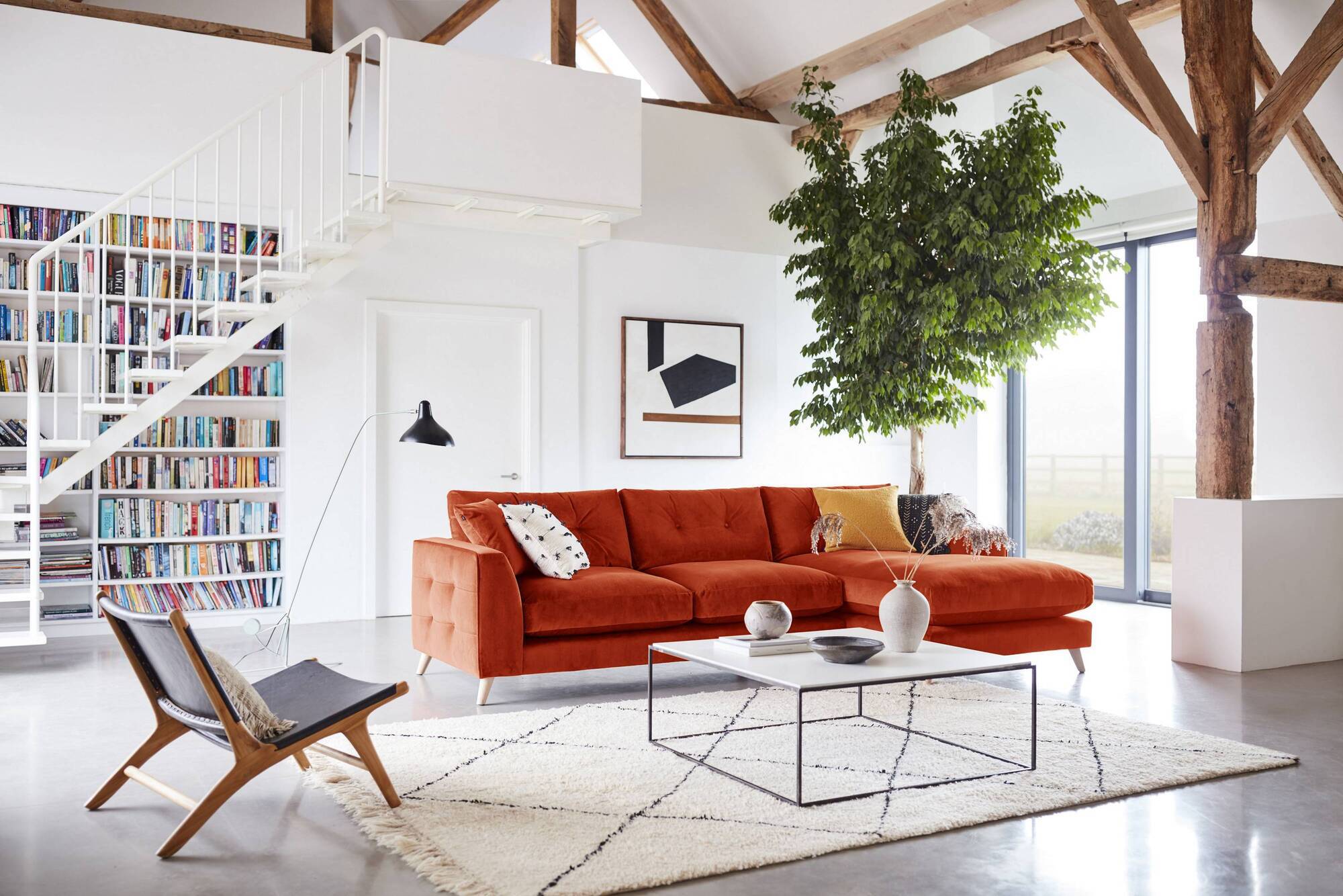 Jo Linehan's room at the Ideal Home Show with the DFS Farnham grand chaise sofa and foots in terracotta velvet, €2,859.
