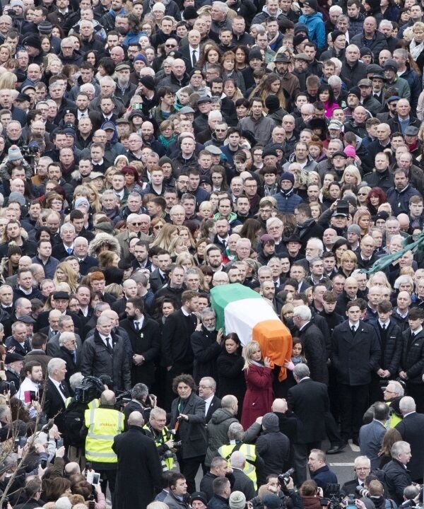 The coffin of the former Sinn Féin and Provisional IRA leader and Deputy First Minister of Northern Ireland Martin McGuinness is carried shoulder high by Mr Adams, Ms O’Neill, and Ms McDonald through the Bogside in Derry on its way to the funeral Mass in St Columba’s Church.