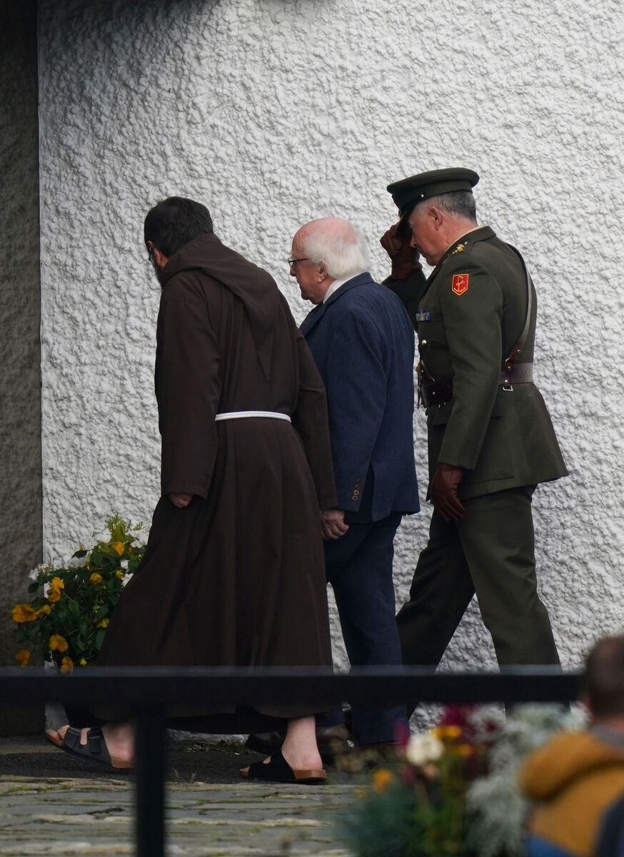 President Michael D Higgins (centre) arrives at St. Michael's Church in Creeslough, for the funeral mass of Robert Garwe and his five-year-old daughter Shauna Flanagan Garwe, who died following an explosion at the Applegreen service station in the village of Creeslough in Co Donegal. President Michael D Higgins (centre) arrives at St. Michael's Church in Creeslough, for the funeral mass of Robert Garwe and his five-year-old daughter Shauna Flanagan Garwe, who died following an explosion at the Applegreen service station in the village of Creeslough in Co Donegal.