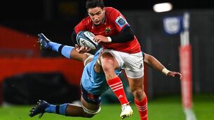 <p>STAR MAN: Joey Carbery of Munster beats the tackle of WJ Steenkamp of Vodacom Bulls on the way to setting up his side's third try during the URC match at Thomond Park in Limerick. Pic: Brendan Moran/Sportsfile</p>