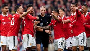 <p>Manchester United players plead with referee Craig Pawson during the Premier League match at Old Trafford, Manchester. Picture  Martin Rickett/PA Wire </p>