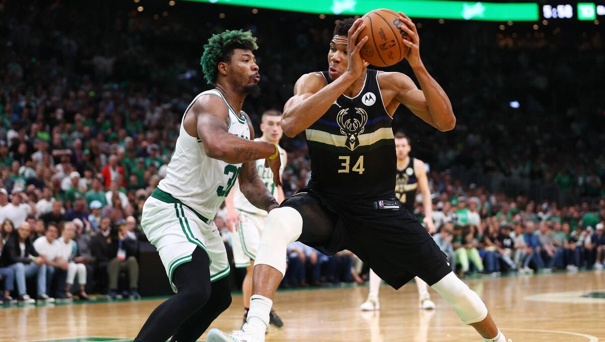 DRIVE: Milwaukee's Giannis Antetokounmpo to the basket against Marcus Smart of the Boston Celtics at TD Garden in Boston DRIVE: Milwaukee's Giannis Antetokounmpo to the basket against Marcus Smart of the Boston Celtics at TD Garden in Boston