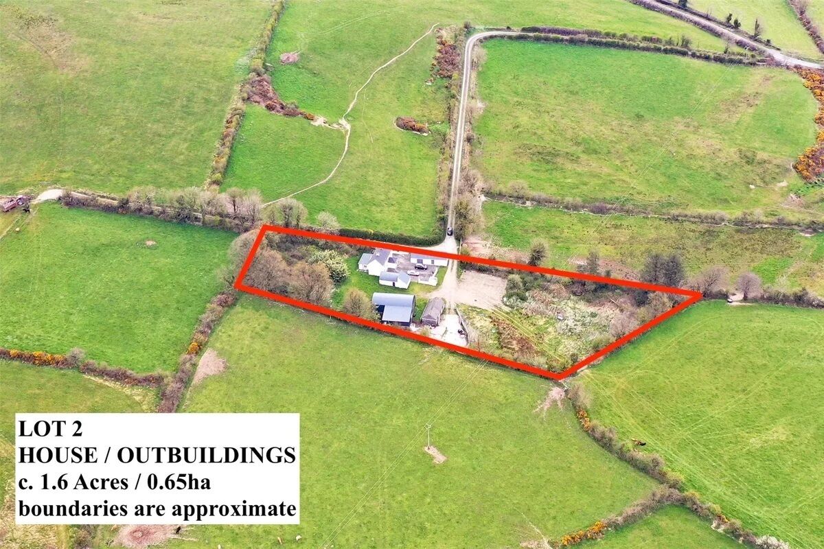 Aerial view of the house and outbuildings of Lot 2 of the 56.6-acre farm for auction.