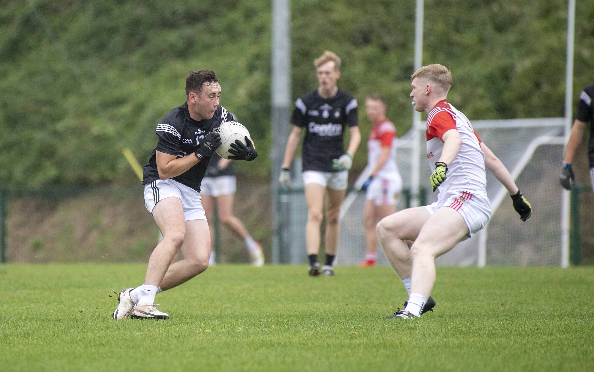 STEADY START: Rochestown's Michael O'Mahony (Ballygarvan) on the move in Tuesday's Corn Ui Mhuirí victory at Dr Crokes GAA grounds. 